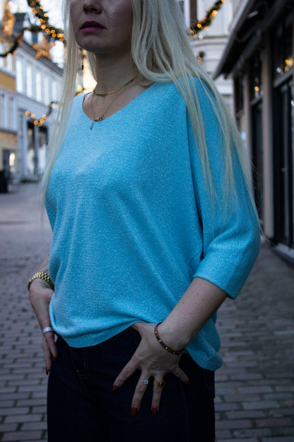Italiensk nytårs sweater med glimmer